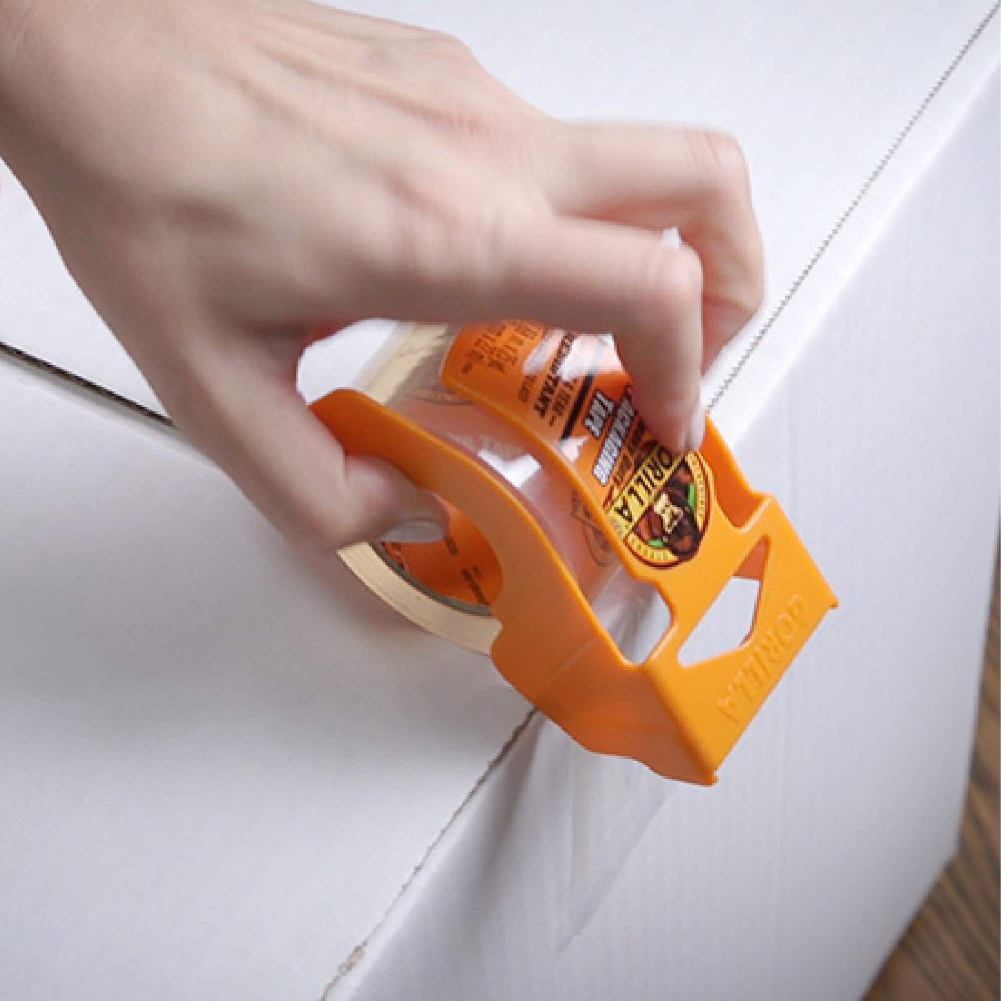 Gorilla Heavy Duty Packing Tape with Dispenser for Moving, Shipping and Storage, 1.88" x 25 yd, Clear, (Pack of 9) - Image 5